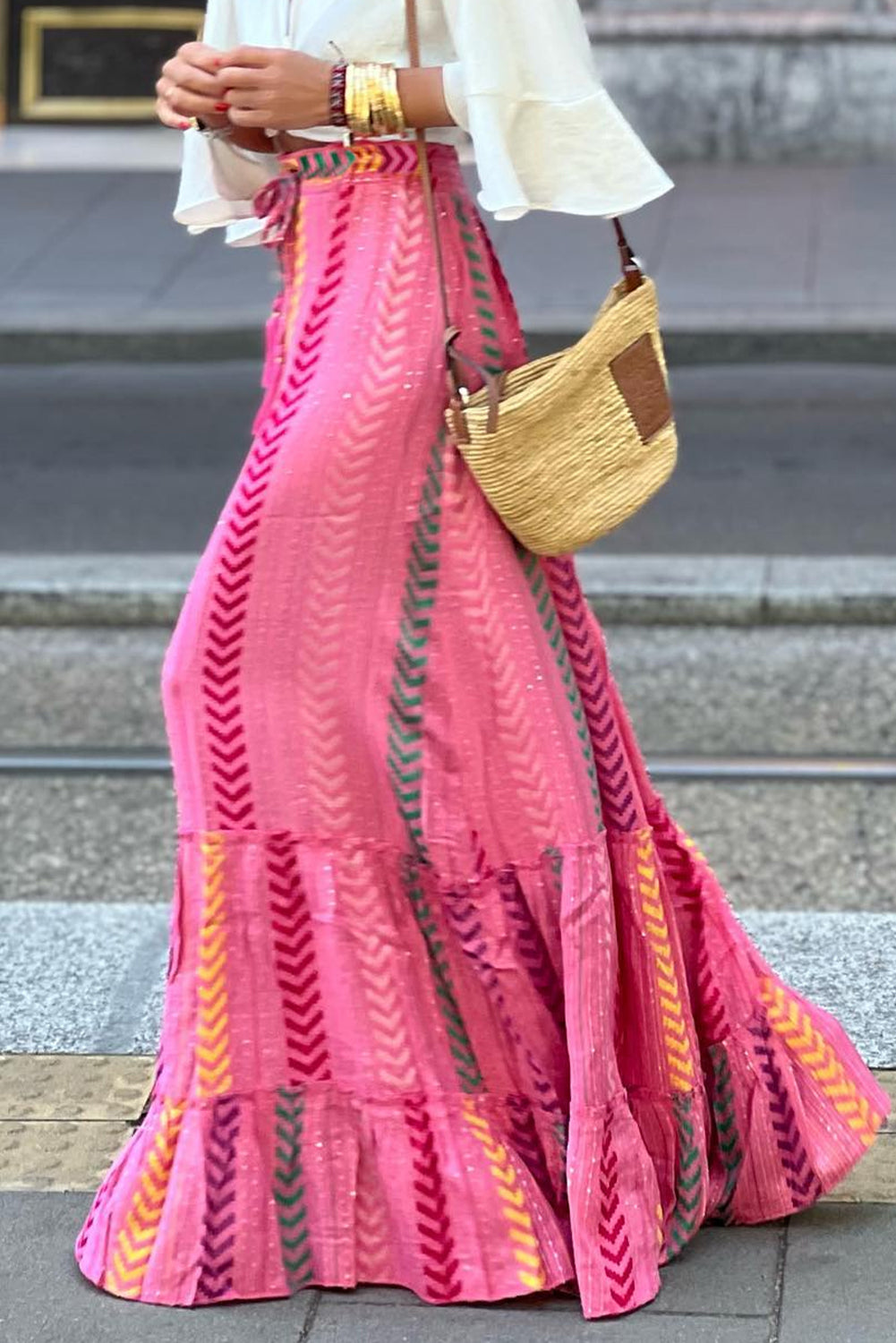 Pink boho maxi skirt with intricate embroidery, flowy and elegant for a free-spirited look.