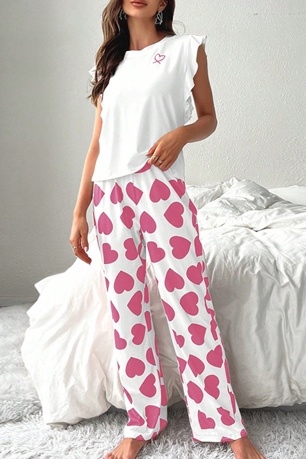 Rosa Pyjama-Set mit ärmellosem Oberteil und Hose mit Herz-Print