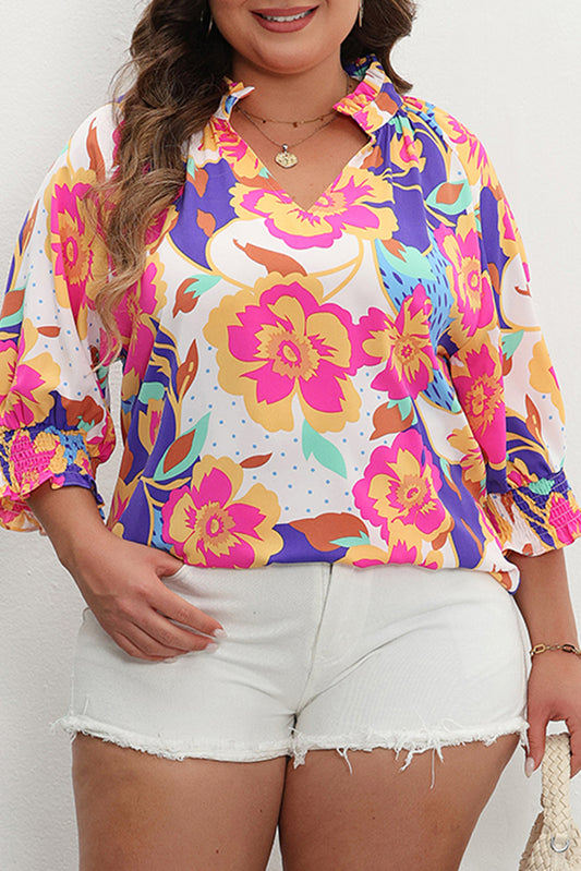 Bluse mit Puffärmeln und Blumenverzierung in Rosarot