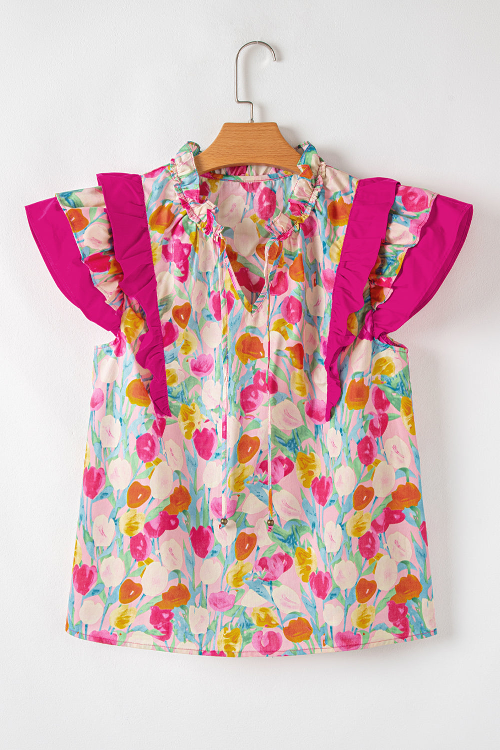 Blouse à col froissé à volants floraux en rose doux