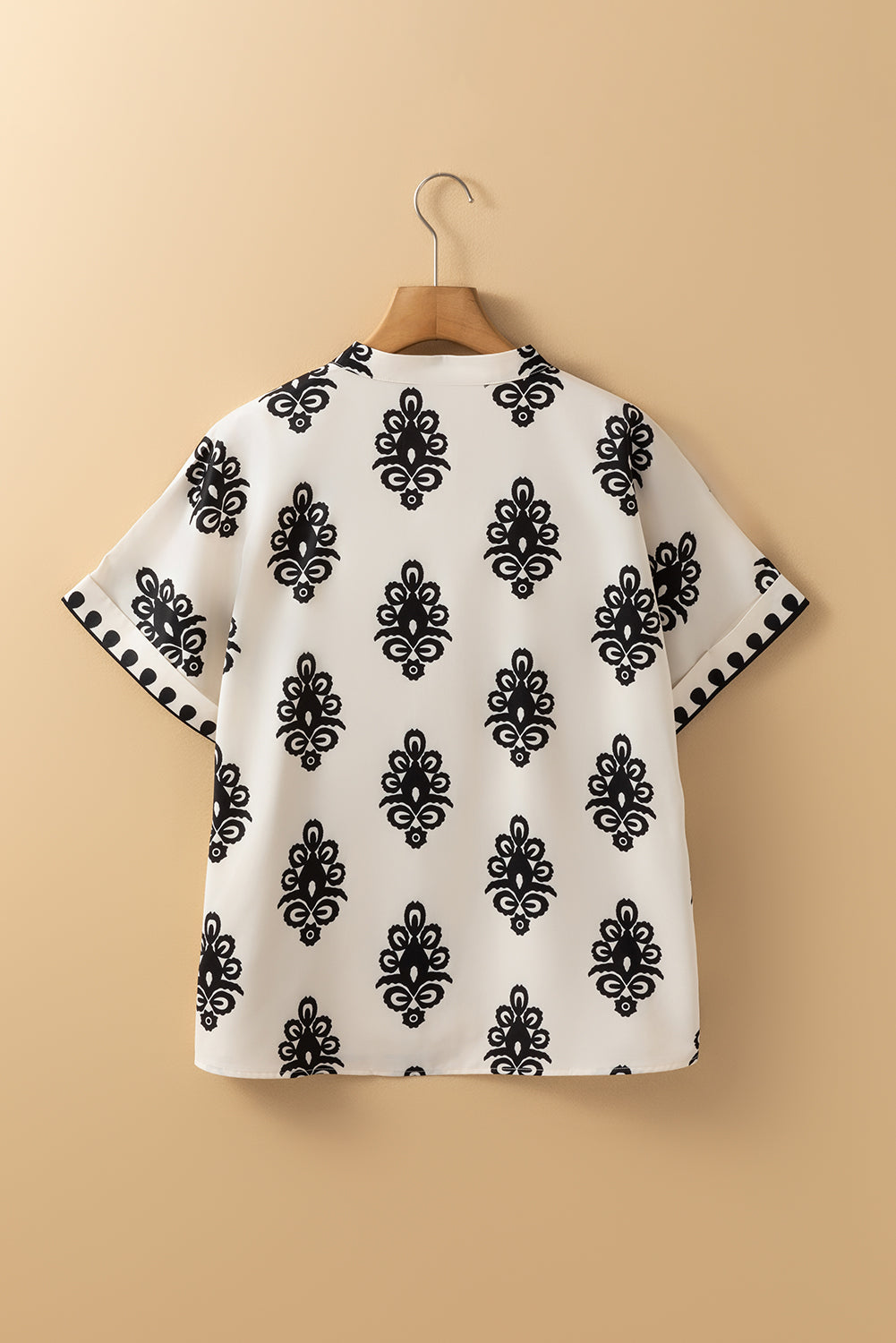 Blouse de cou à manches courtes à imprimé géométrique noir