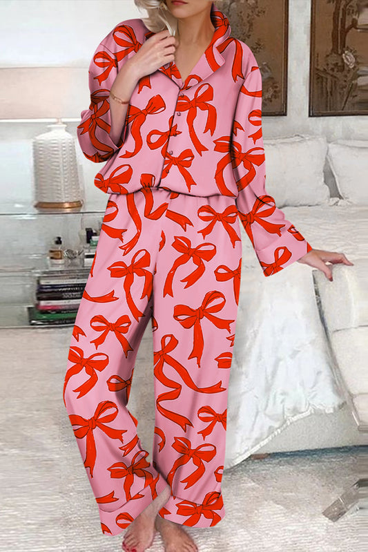 Rosa Pyjama-Set mit Knopfleiste und weiten Hosen mit durchgehendem Schleifen-Print