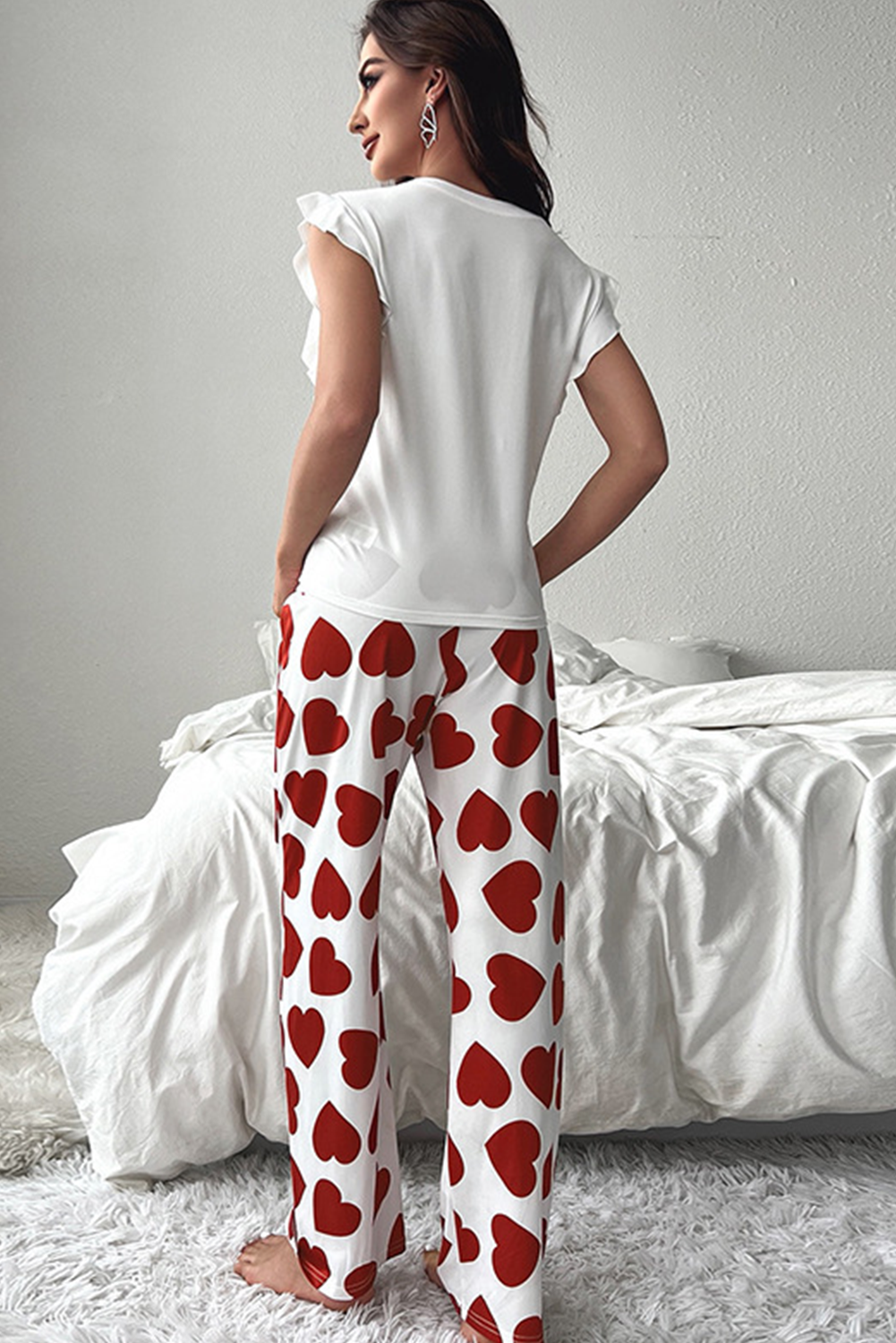 Rosa Pyjama-Set mit ärmellosem Oberteil und Hose mit Herz-Print