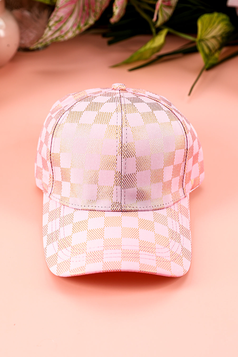 Gorra de béisbol a cuadros de color rosa claro