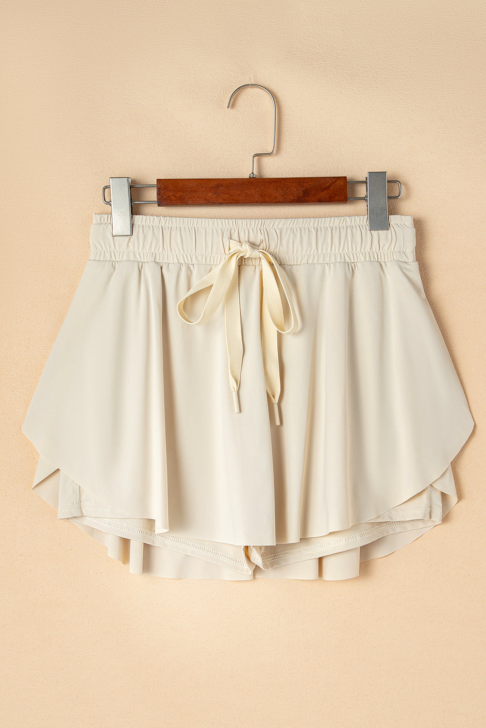 Skort de tenis de cintura con cintura de cintura beige