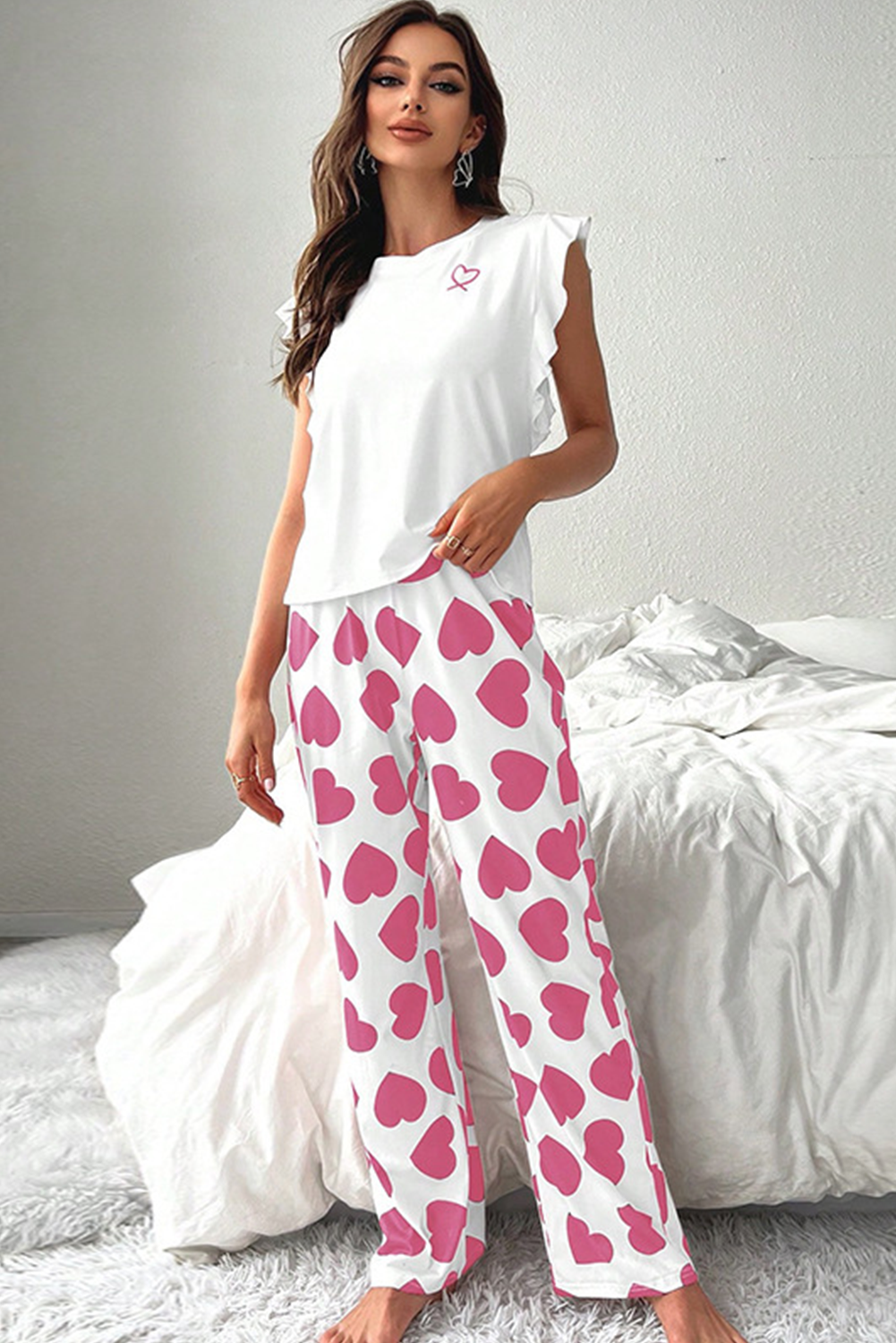 Rosa Pyjama-Set mit ärmellosem Oberteil und Hose mit Herz-Print