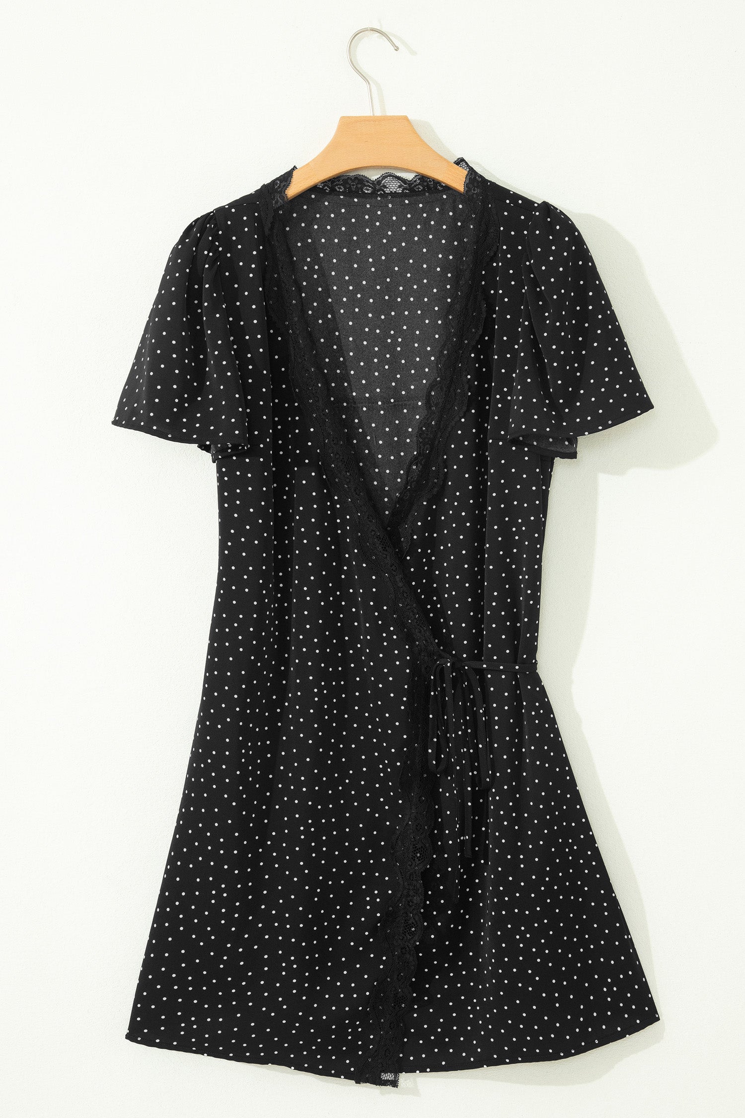 navya wrap mini dress in basic polka black Jacquelyn Plisse Mini Dress Black | Polka Dot | Black | Polka Dot | Womens