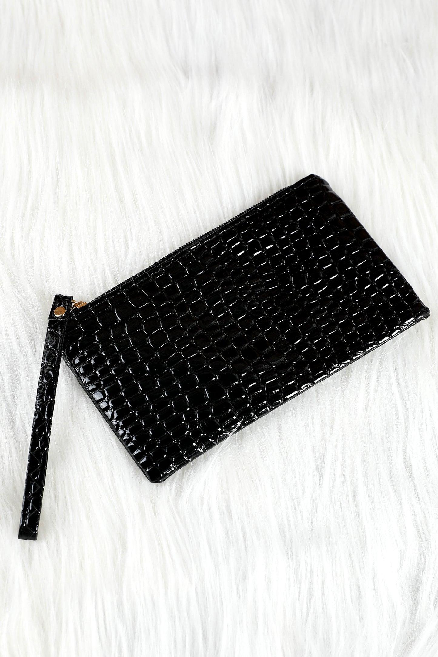 Schwarze Clutch mit Reißverschluss und Krokodilmuster