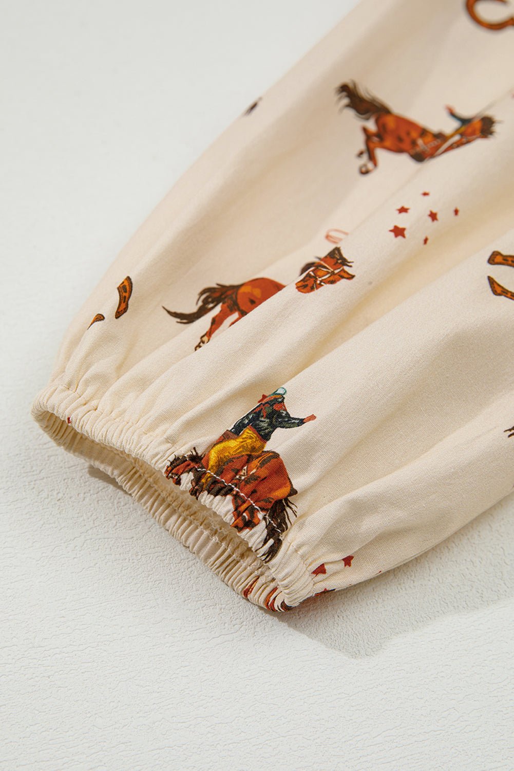 Apricot Rodeo Print Tied Front Puff Sleeve Peplum Top - MAD RUFFI