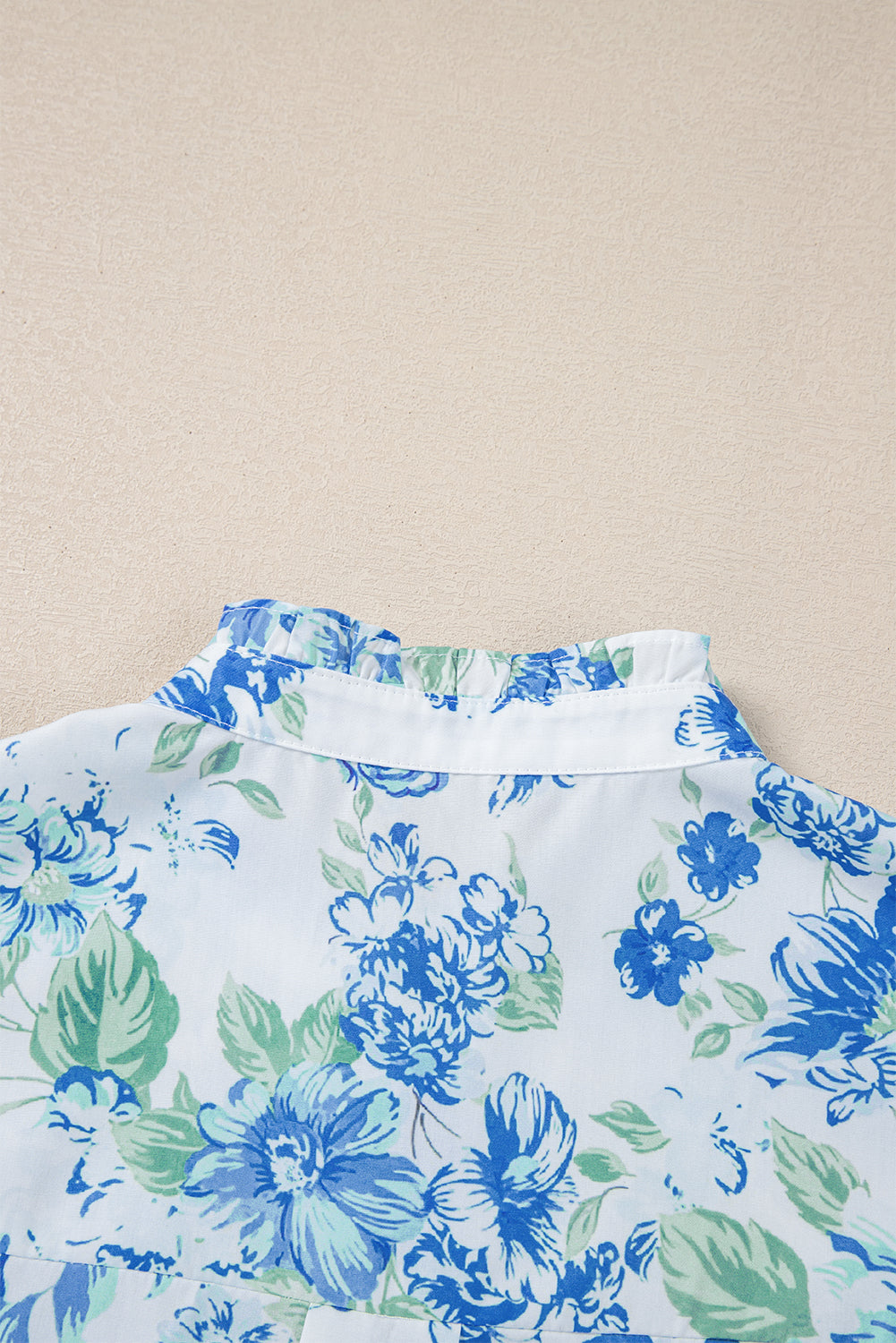 Camisa de volante con volante con estampado floral azul cielo