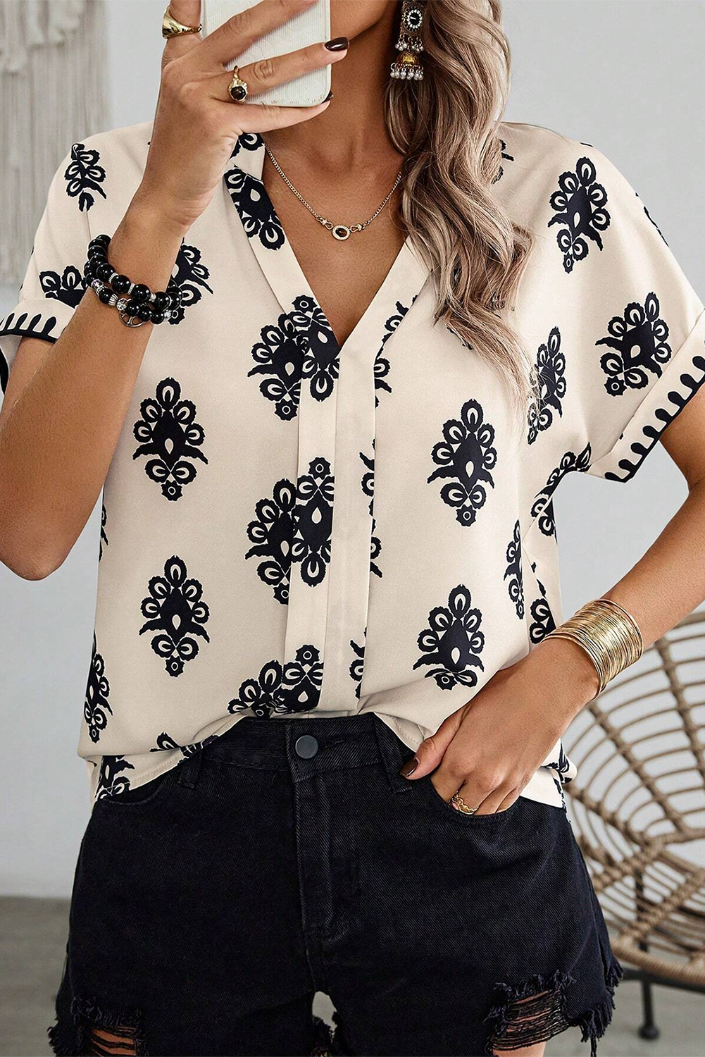 Blusa de cuello con manga corta de estampado geométrico V