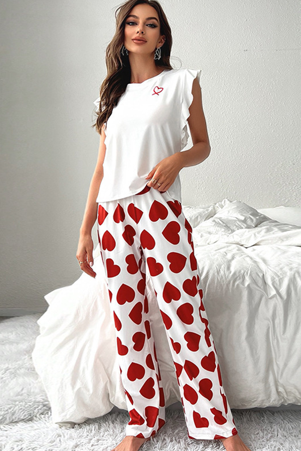 Rosa Pyjama-Set mit ärmellosem Oberteil und Hose mit Herz-Print