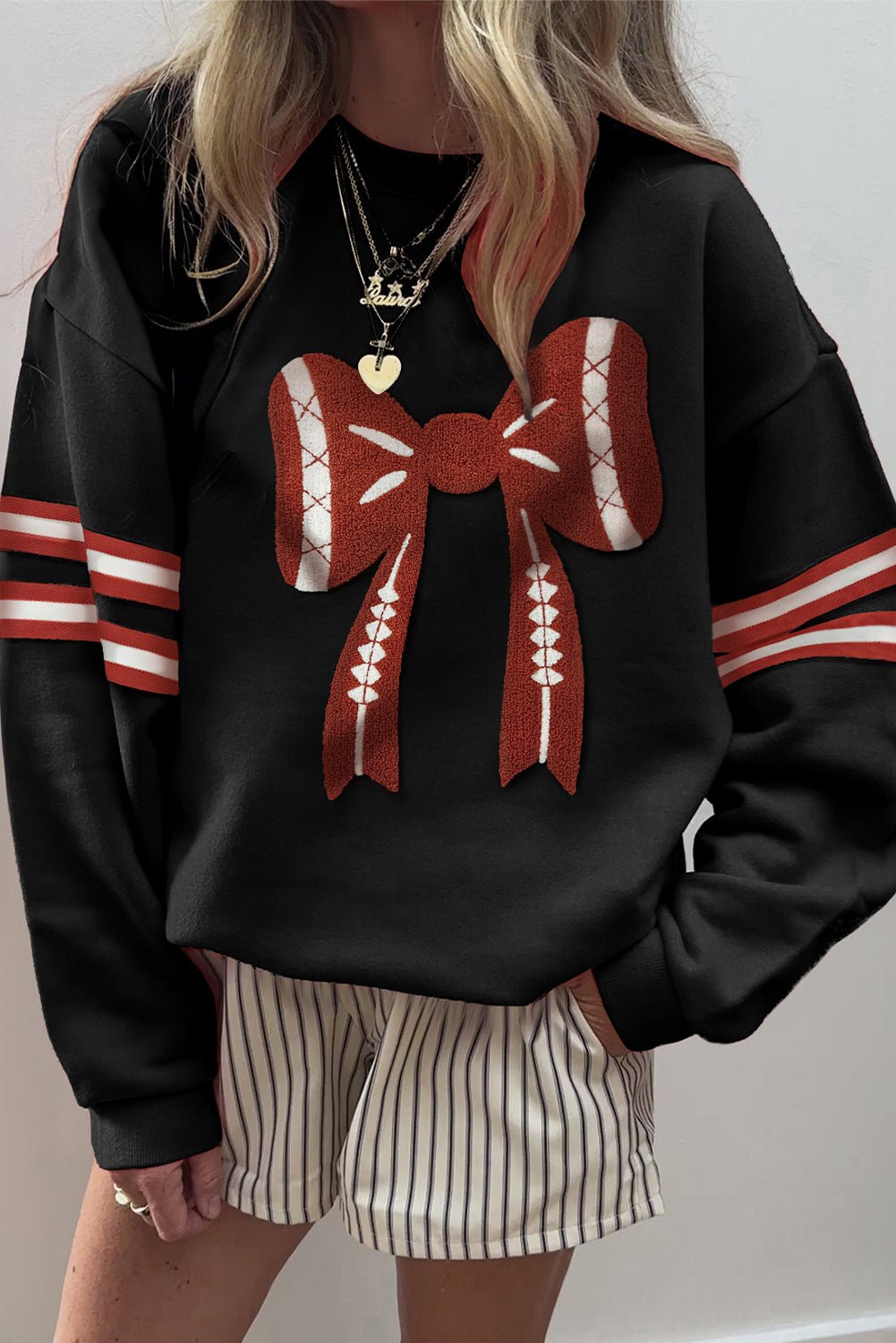 Black Varsity Baseball Bow Graphic Striped Sleeve Baggy Sweatshirt - MAD RUFFI