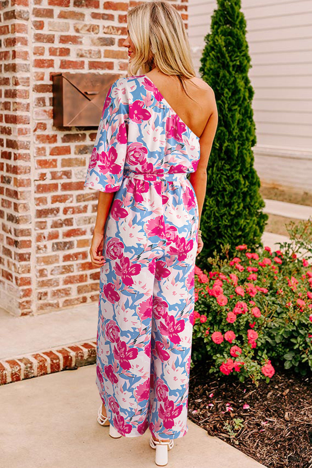 Pink Asymmetrical Floral Print Jumpsuit with Half Sleeve and Belted Waist