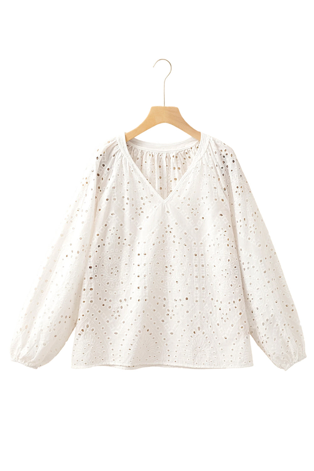 Blusa con manga de hojaldre bordado con ojal