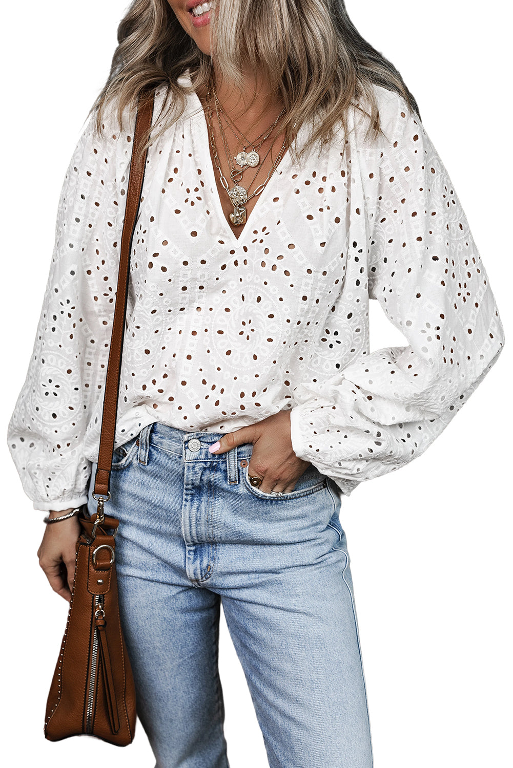 Blouse à manches bouffées brodées à œillet blanc