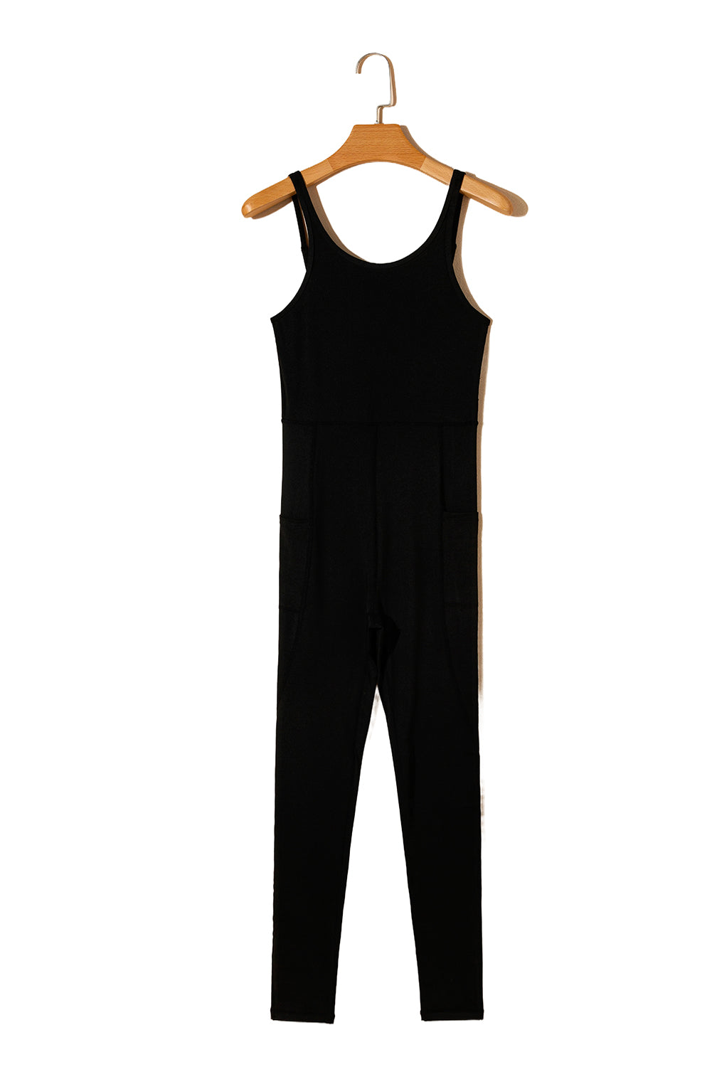 Schwarzer, rückenfreier, schmal geschnittener Sport-Jumpsuit mit hoher Taille und Seitentaschen