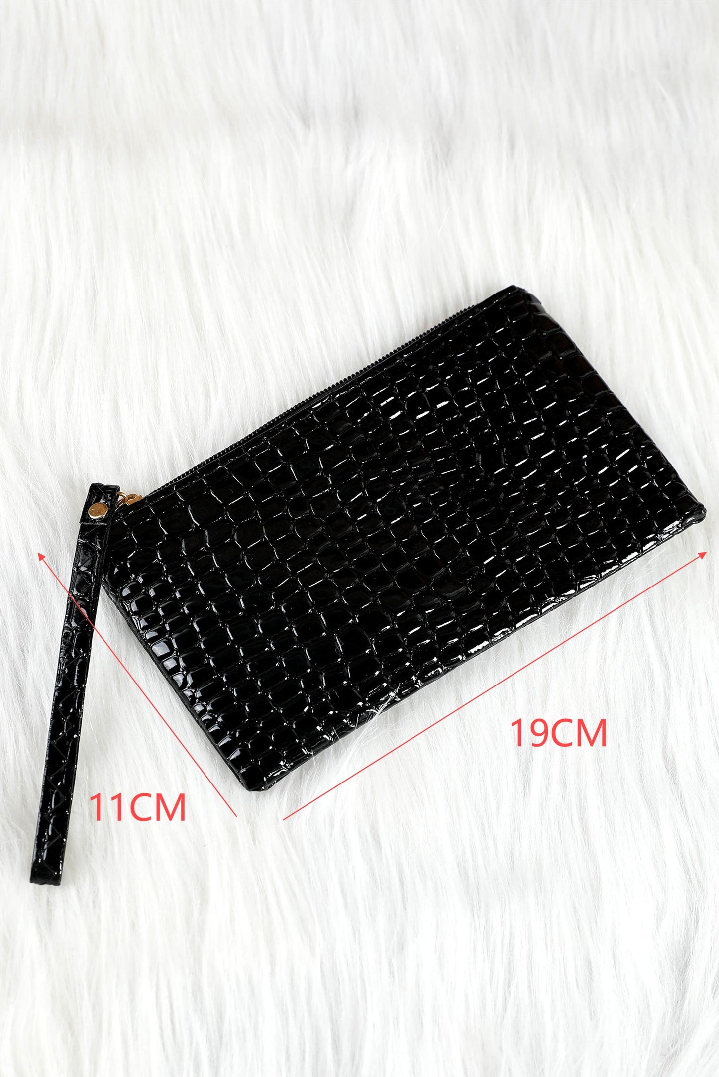 Schwarze Clutch mit Reißverschluss und Krokodilmuster