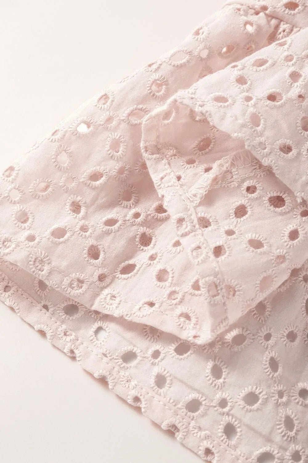 Embroidered Eyelets Ruffled Hem Sleeveless Mini Dress - MAD RUFFI