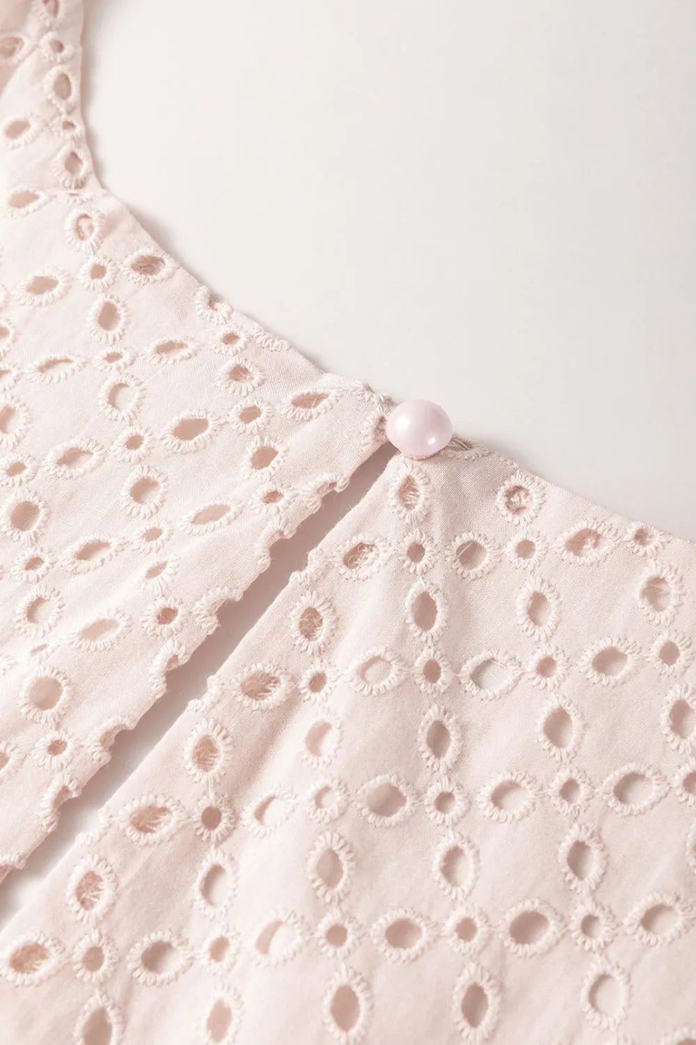 Embroidered Eyelets Ruffled Hem Sleeveless Mini Dress - MAD RUFFI