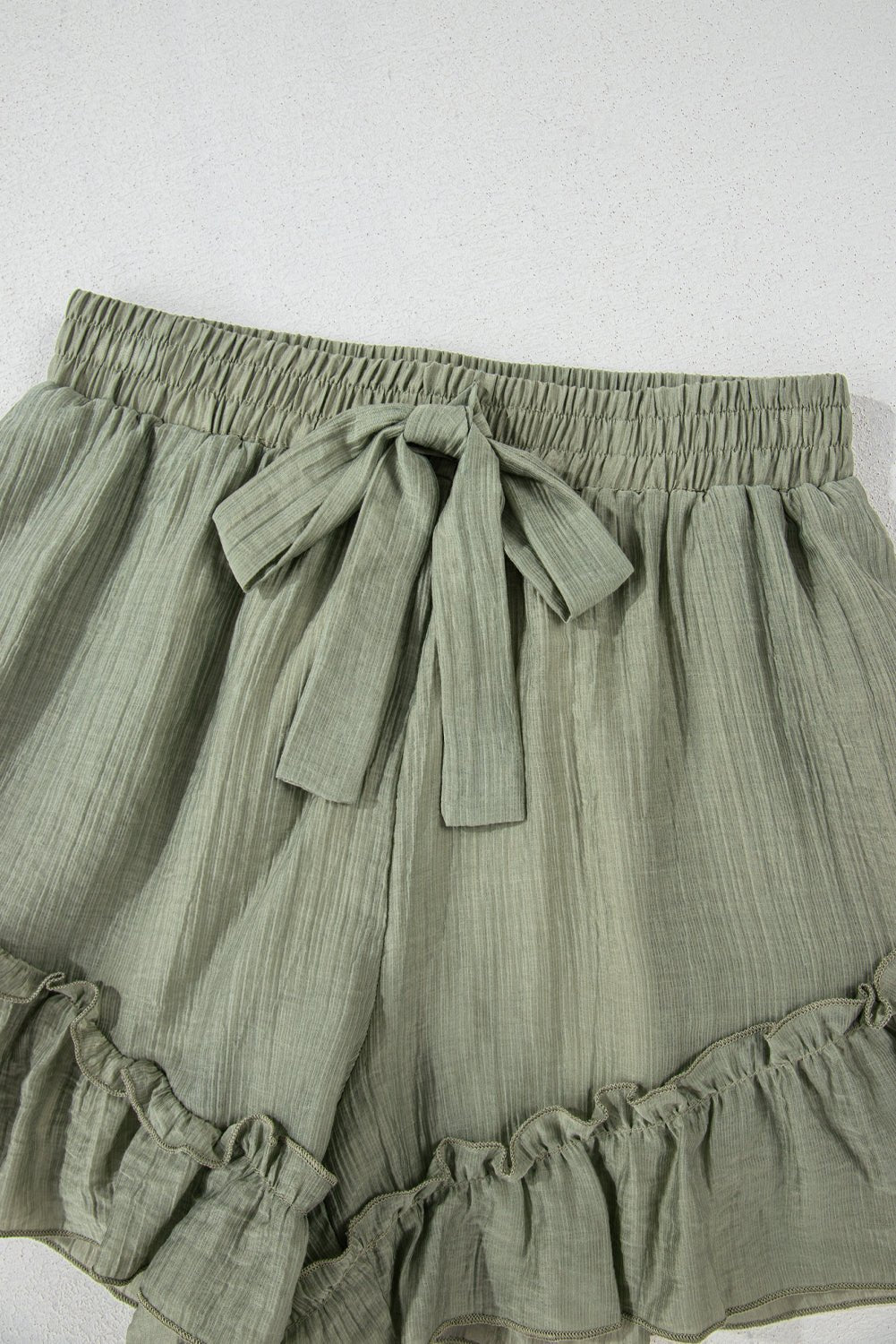 laurel green textured tie waist ruffle hem shorts - MAD RUFFI