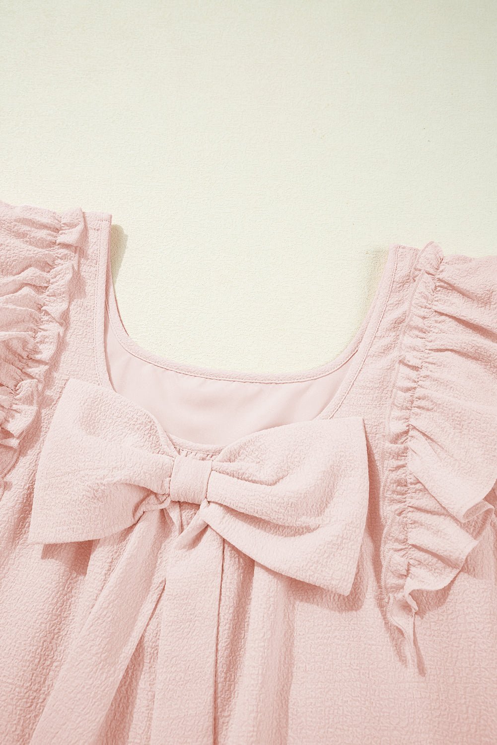 Light Pink Textured Flutter Sleeve Square Neck Bow Back Mini Dress - MAD RUFFI