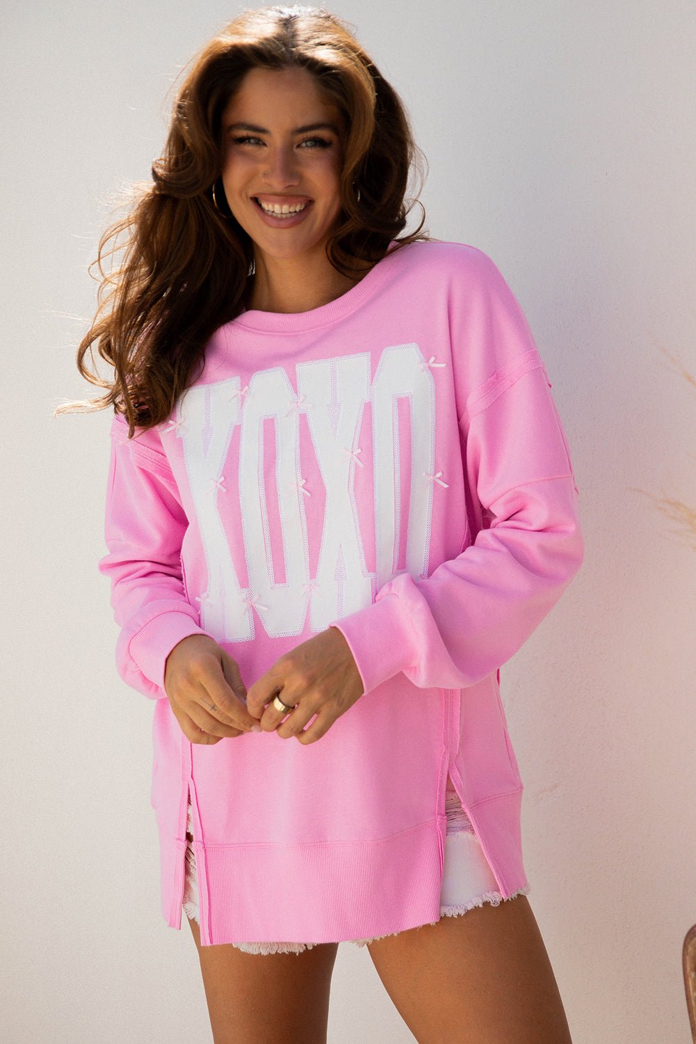 Pink Bow Sequin XOXO Letter Graphic Exposed Seam Baggy Sweatshirt - MAD RUFFI