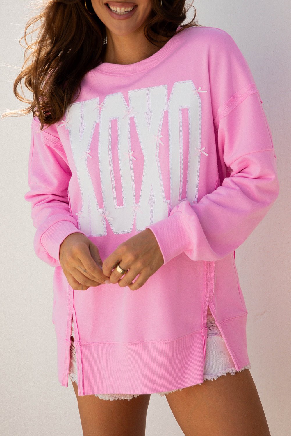 Pink Bow Sequin XOXO Letter Graphic Exposed Seam Baggy Sweatshirt - MAD RUFFI