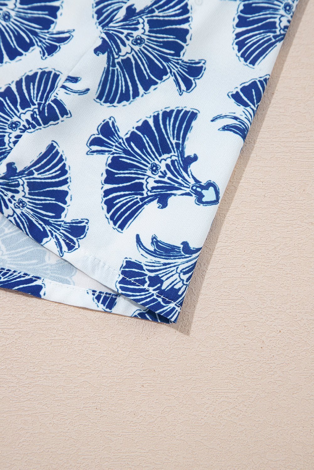 Sky Blue Geometric Print Tassel Drawstring V Neck Blouse - MAD RUFFI