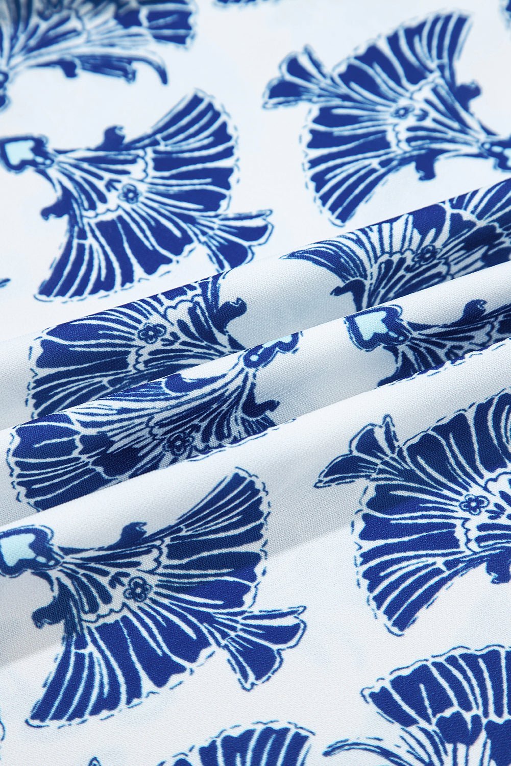 Sky Blue Geometric Print Tassel Drawstring V Neck Blouse - MAD RUFFI