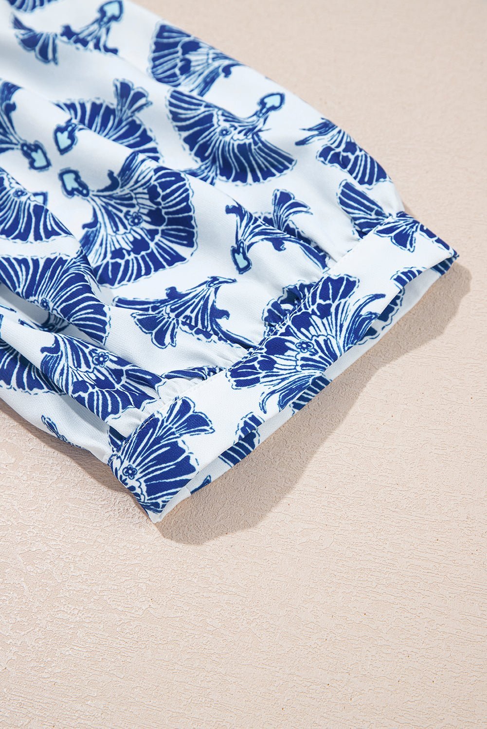 Sky Blue Geometric Print Tassel Drawstring V Neck Blouse - MAD RUFFI