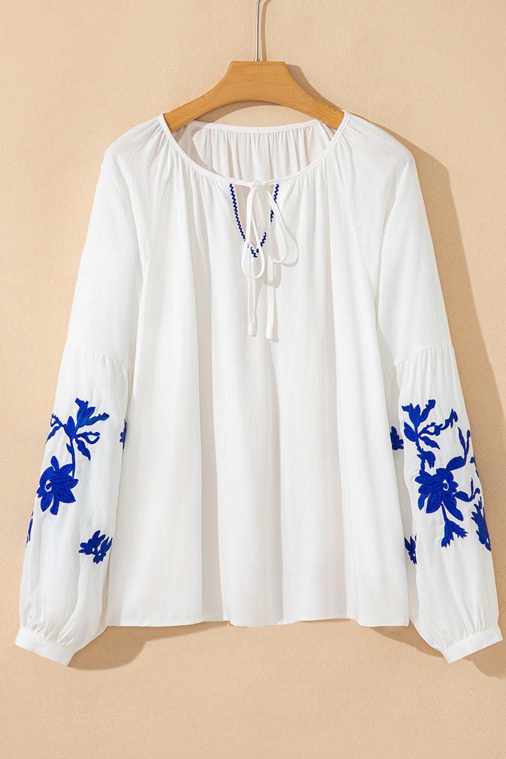 White Floral Embroidered Drawstring V Neck Blouse - MAD RUFFI